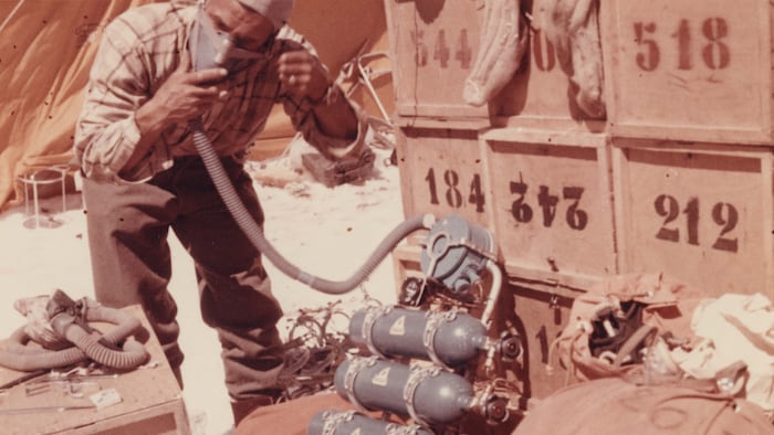 Erich Abram testing the oxygen equipment. They were crucial for the summit victory. 