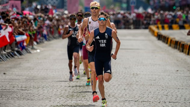 Alex Yee won the men's triathlon. (Bild: AP ( via APA) Austria Presse Agentur/ASSOCIATED PRESS)