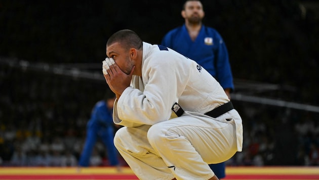 Aaron Fara scheitert in der ersten Runde. (Bild: APA/AFP/Luis ROBAYO)