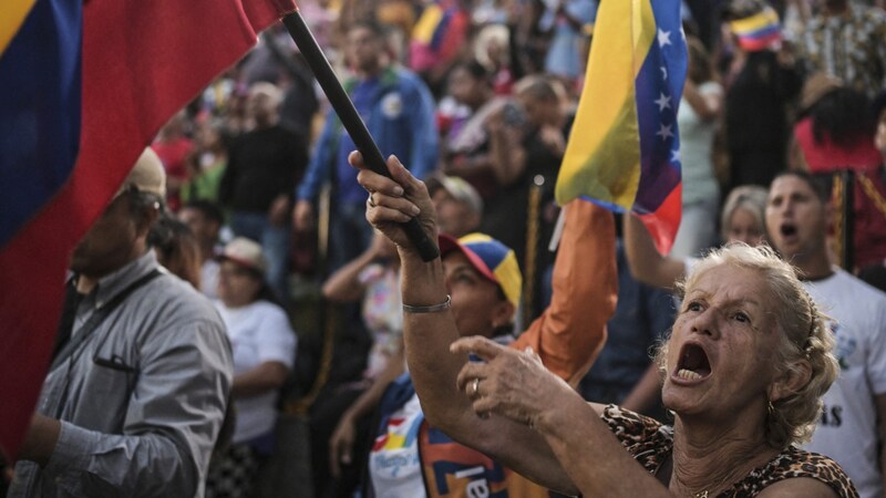 Madura supporters and supporters (Bild: AFP/Yuri Cortez)