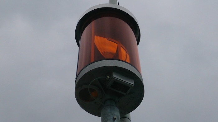 These lights indicate storm warnings. 