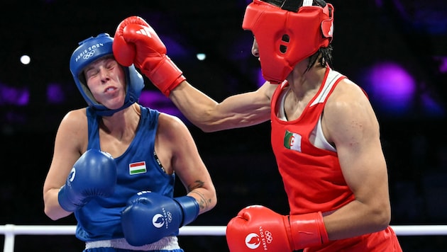 Imane Khelif (right) came out on top against Anna Luca Hamori. (Bild: AFP/MOHD RASFAN)