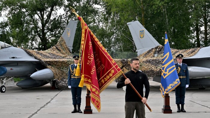 Selensky waving a flag.