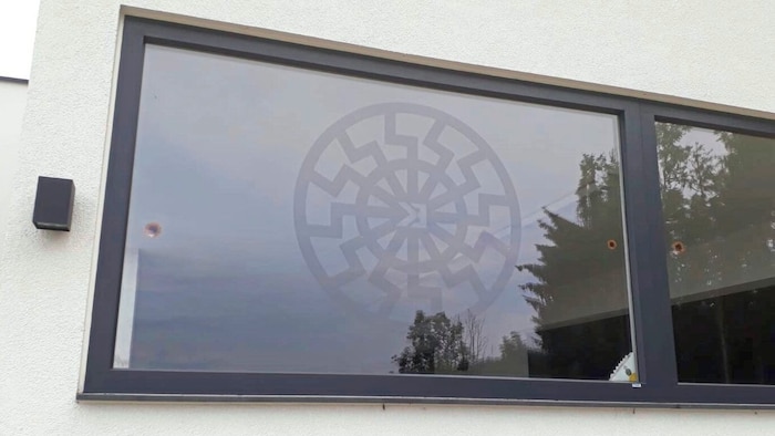 The "Black Sun" is considered a Nazi symbol and is - actually - forbidden in public.