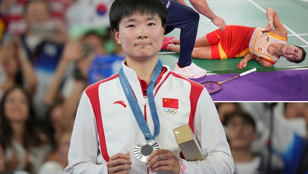 Tolle Geste von He Bingjiao nach Carolina Marins Semifinal-Verletzung. (Bild: AP/Kin Cheung, Dita Alangkara)