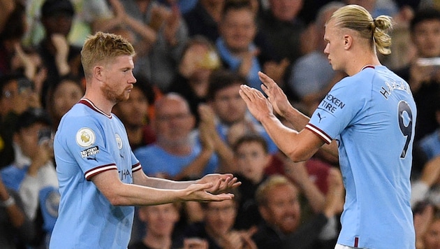 Kevin De Bruyne (left) and Erling Haaland (Bild: APA/AFP/Oli SCARFF)