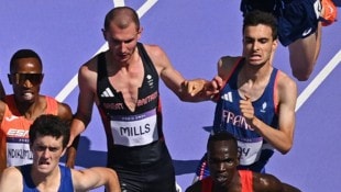 George Mills (Mitte) und Hugo Hay (rechts) geriete während und nach dem Rennen aneinander.