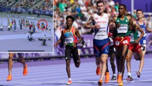 Der Kameramann befand sich plötzlich mitten im Olympia-Lauf. 