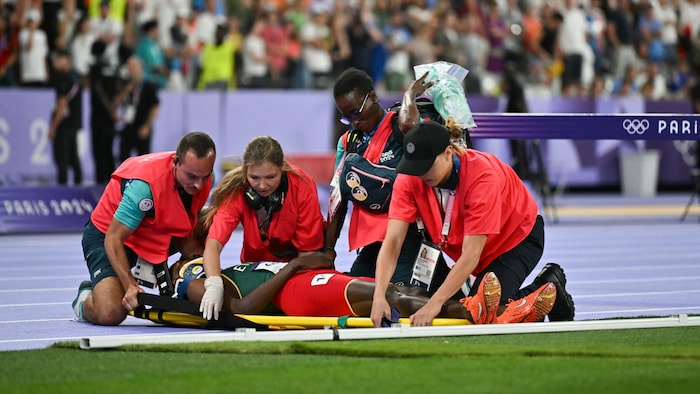 Lamecha Girma had to be taken away by the rescue team on a stretcher.