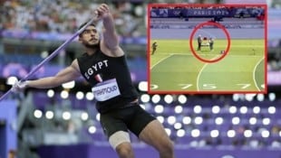 Da hatten Moustafa Mahmoud und ein TV-Mitarbeiter wohl großes Glück ... (Bild: Associated Press; Screenshot (www.eurosport.de))