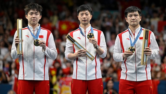 Wang Chuqin, Ma Long and Fan Zhendong (Bild: AFP/APA/WANG Zhao)