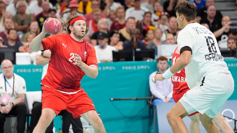 Mikkel Hansen (left) celebrated a successful farewell. (Bild: AP ( via APA) Austria Presse Agentur/ASSOCIATED PRESS)