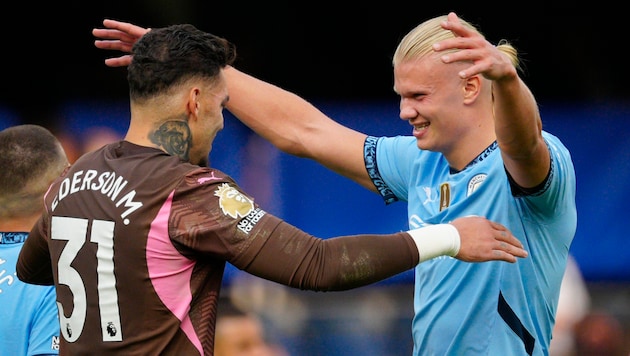 Erling Haaland und Ederson haben gut lachen. (Bild: AP)