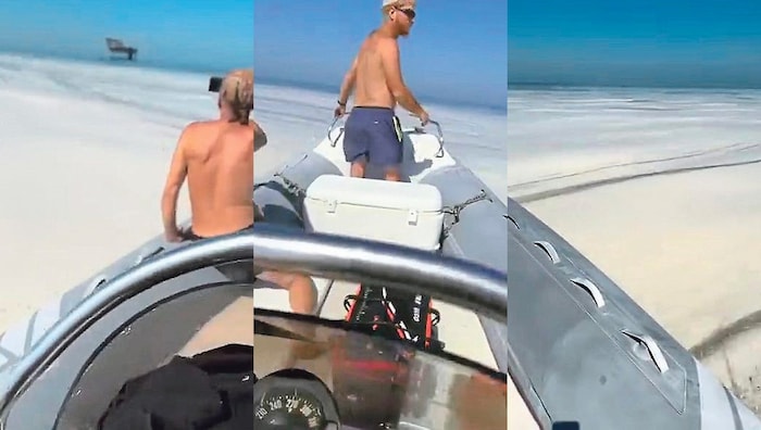 Das Boot von Edo Varini durchpflügt die schleimige Algenmasse, die eher an eine verschmutzte Müllhalde als an das azurblaue Meer erinnert.