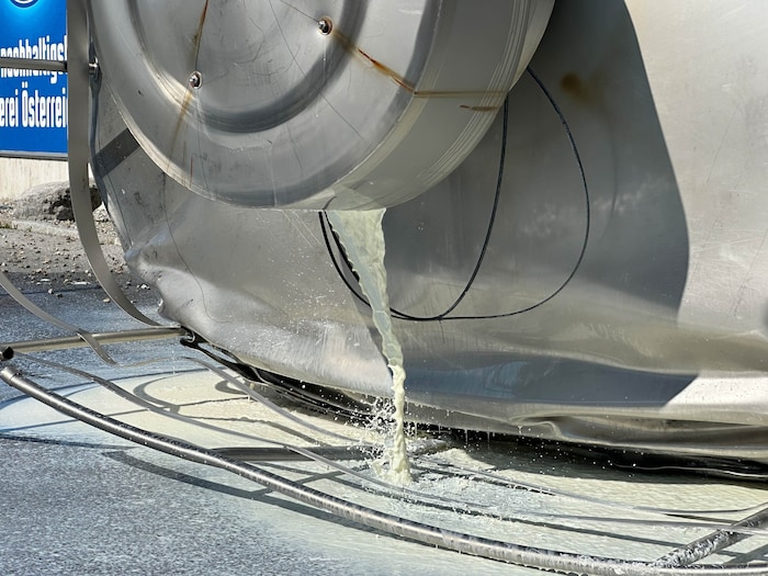 According to initial reports, only a small amount of milk escaped from the overturned tank.