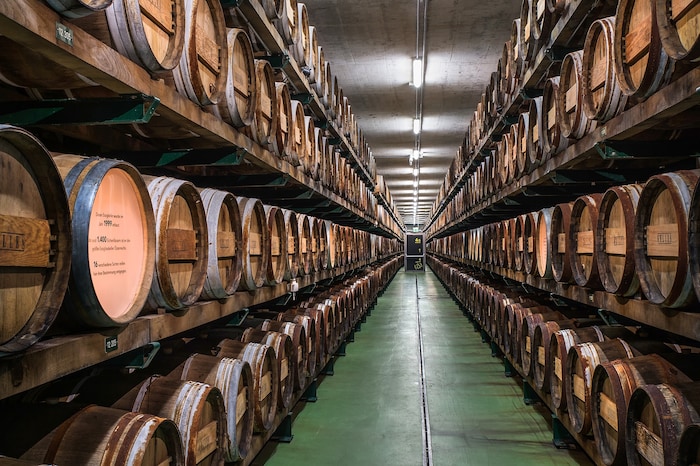 There are 1400 oak barrels filled with vinegar at the farm in Riegersburg.