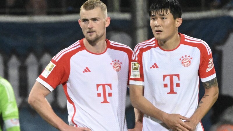 Matthijs de Ligt (l.) und Kim Min-Jae (Bild: AFP or licensors)