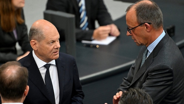 Olaf Scholz and Friedrich Merz rarely see eye to eye. (Bild: AFP/RALF HIRSCHBERGER)