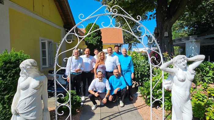 Brigitte Hofer with her staff.