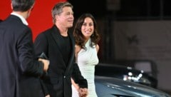 Brad Pitt ist mit Ines de Ramon wieder glücklich. Sie soll den Hollywoodstar auch dazu gedrängt haben, den Rosenkrieg mit Angelina Jolie zu beenden. (Bild: APA/AFP/Alberto PIZZOLI)