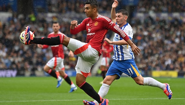 Casemiro (left) is Manchester United's top earner. (Bild: AFP or licensors)