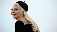 Lady Gaga ist sehr glücklich mit ihrem Verlobten. (Bild: APA Pool/AFP/Marco BERTORELLO)