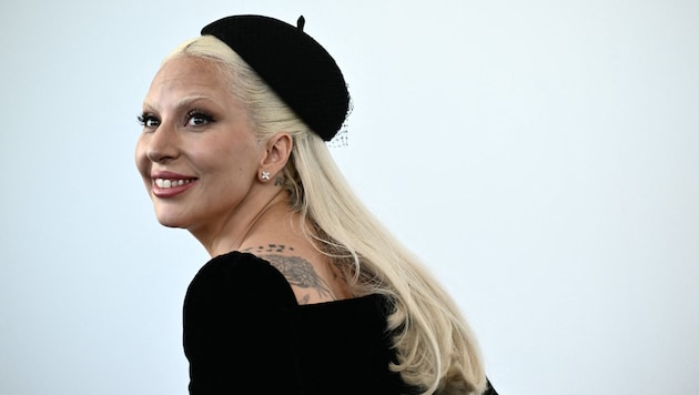 Lady Gaga ist sehr glücklich mit ihrem Verlobten. (Bild: APA Pool/AFP/Marco BERTORELLO)