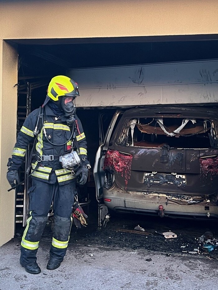 A car had apparently caught fire in the garage.
