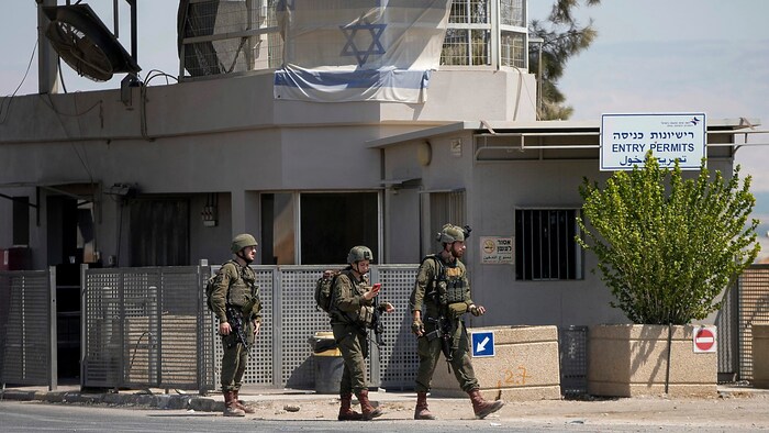 Israeli soldiers near the site of the attack