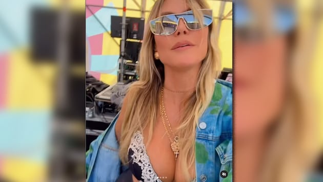 Heidi Klum partied in just her bra at a festival performance by Tom and Bill's band Tokio Hotel. (Bild: instagram.com/heidiklum)