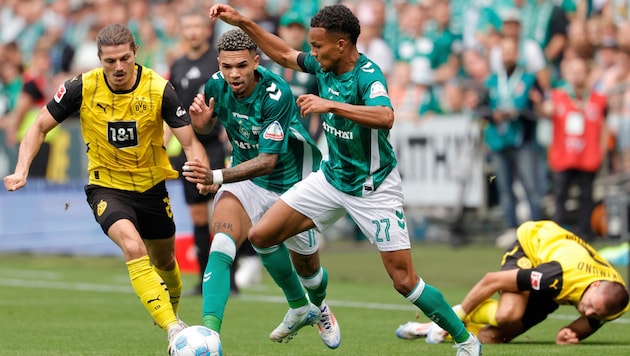 Marcel Sabitzer (l.) tanzt mit Dortmund auf drei Hochzeiten. (Bild: AFP)