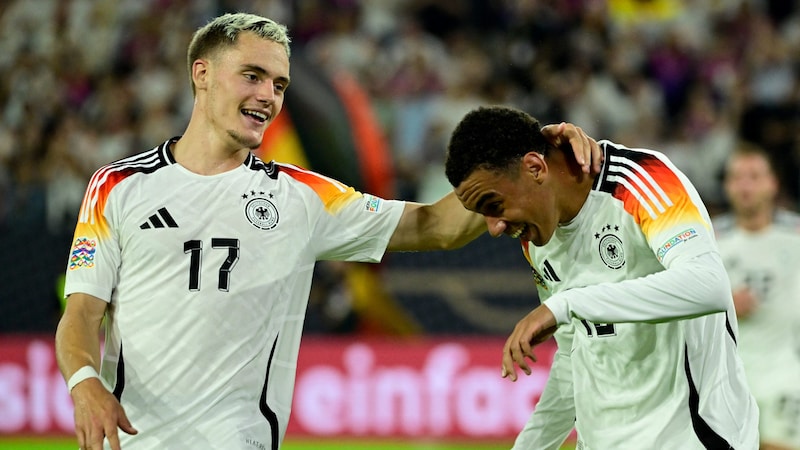 Strong as bears together: Florian Wirtz (l.) and Jamal Musiala (Bild: AFP/APA/John MACDOUGALL)