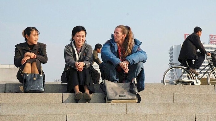 Filmmaker Brigitte Weich in North Korea with former team stars.