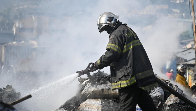 Ein Feuerwehrmann auf Haiti (Symbolbild) (Bild: AFP)