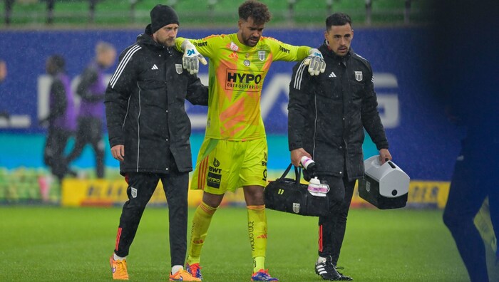 Lawal had to be stretchered off the pitch.