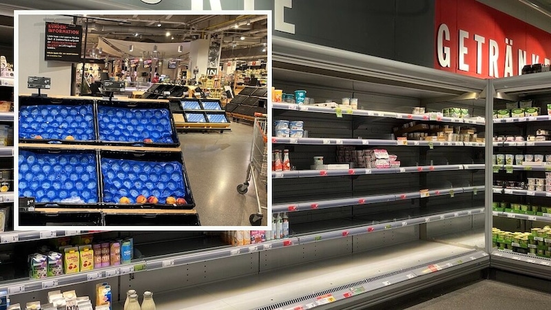 Supermarktkunden wundern sich über leere Regale. (Bild: Martina Münzer, Krone KREATIV)