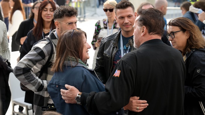 Schwarzenegger hugged his half-cousin Waltraud Walter. They hadn't seen each other for 60 years.