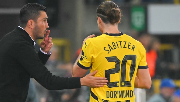 Marcel Sabitzer with Dortmund coach Nuri Sahin (Bild: NICOLAS TUCAT)