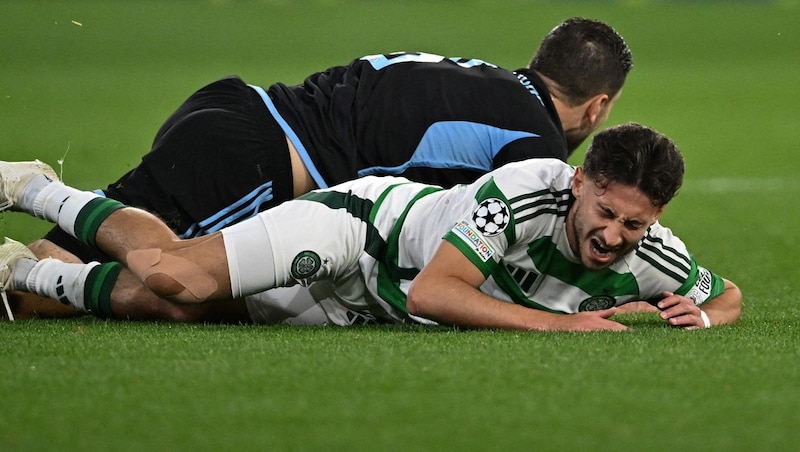 That was the end of the friendship: Wimmer brusquely knocked Kühn over. (Bild: AFP/APA/ANDY BUCHANAN)