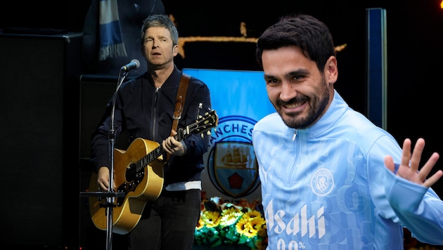 Manchester freut sich über zwei Rückkehrer: Noel Gallagher (l.) und Ilkay Gündogan (Bild: AFP/APA/Getty Images via AFP/GETTY IMAGES/KEVIN WINTER, ASSOCIATED PRESS)