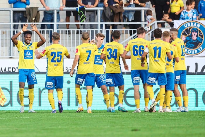 Boateng and his colleagues celebrated his hat-trick.