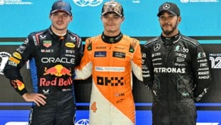 Max Verstappen, Lando Norris und Lewis Hamilton (von li. nach re.) (Bild: AFP/MOHD RASFAN)