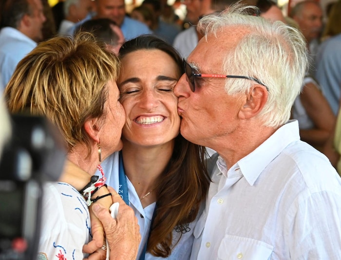 Mom Eva and dad Ernst celebrate Lara Vadlau's Olympic victory.