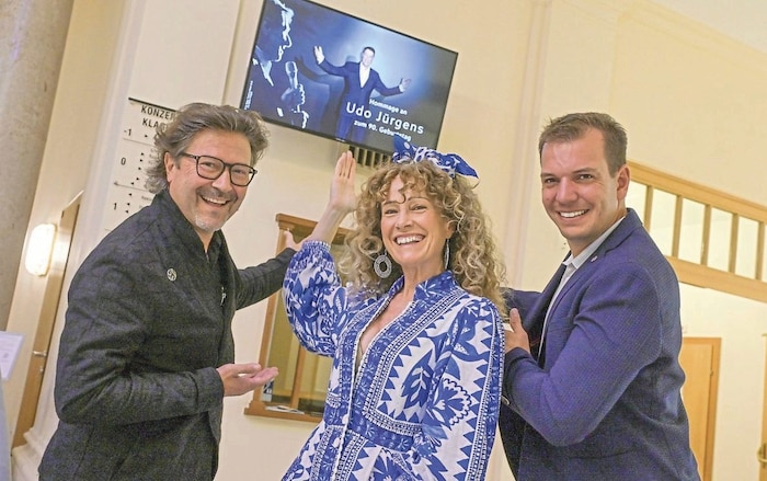 Big fans: musician Peter Karpf, singer Sandra Pires and sportsman Markus Salcher