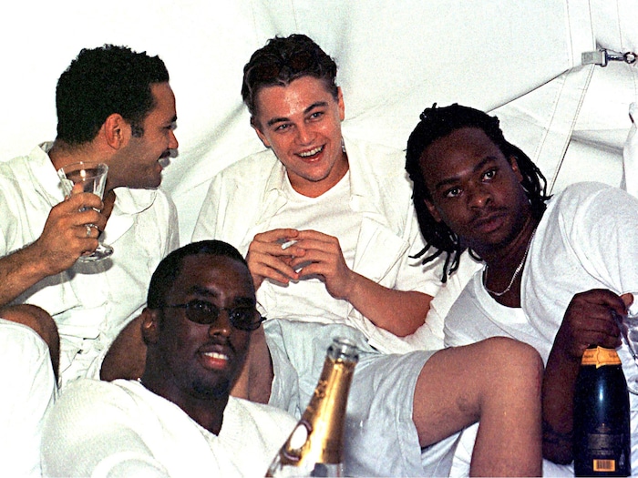 DiCaprio laughing and smoking with P. Diddy