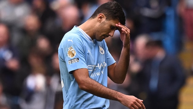 Rodri muss die gesamte verbleibende Saison zusehen.  (Bild: AFP/APA/Oli SCARFF)