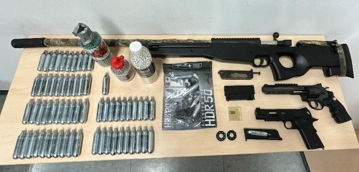 These weapons were seized in the suspect's apartment.