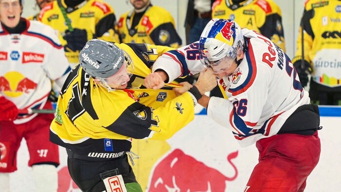 Also let their fists do the talking: Lacroix and Hochkofler (right).