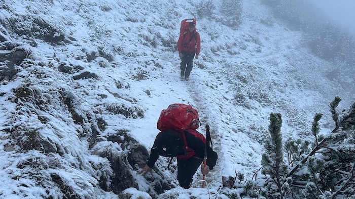 The mountain rescuers ascended late Thursday afternoon.