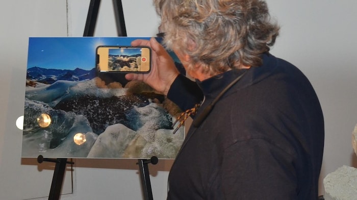 The author demonstrates the amazing technology of the app that turns pictures into moving ...